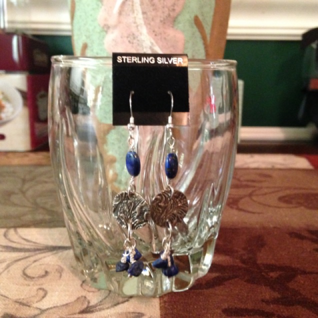 Silver pieces accented with Lapis Lazuli stones.